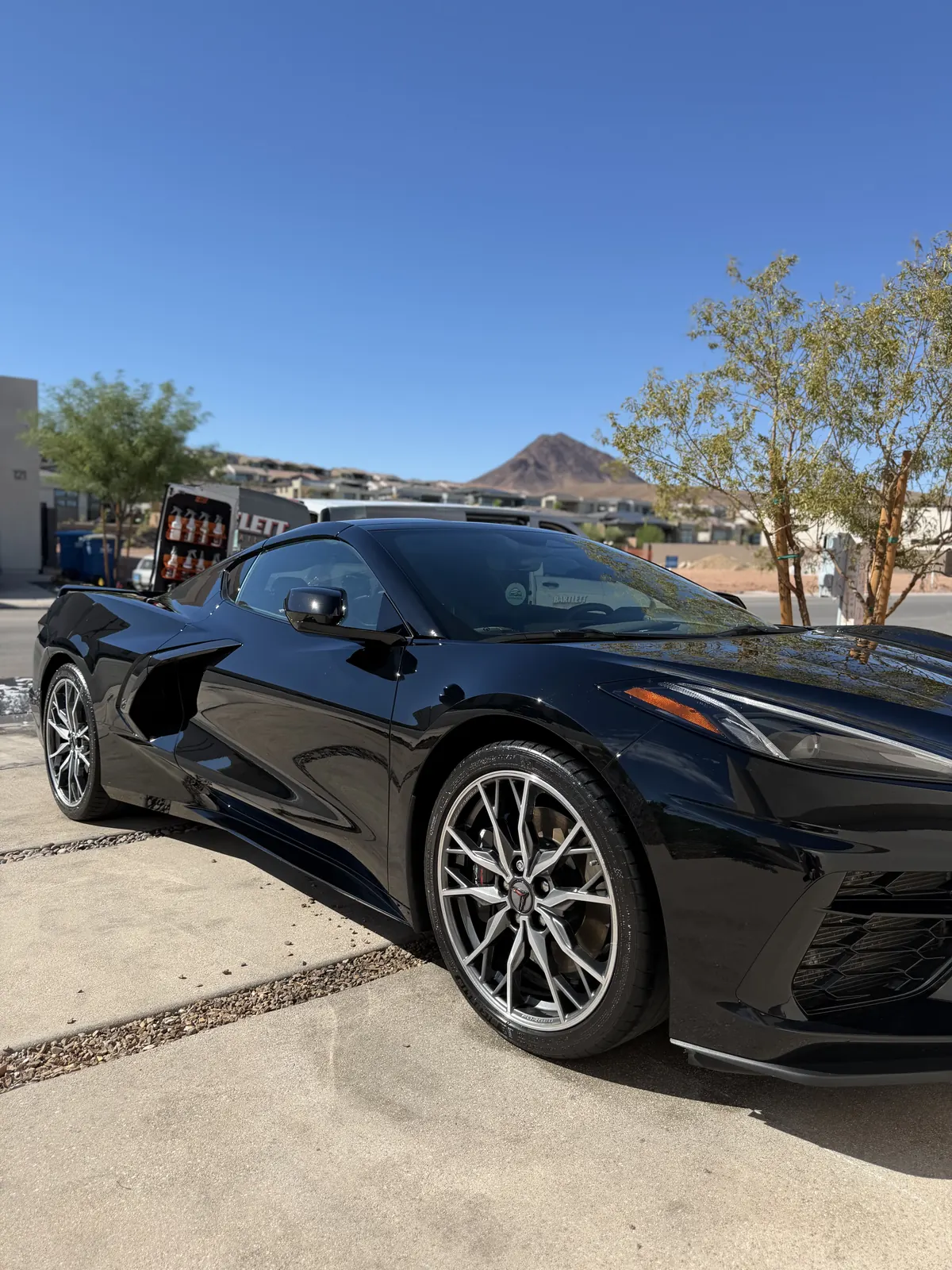 Black sports car with corrected paint