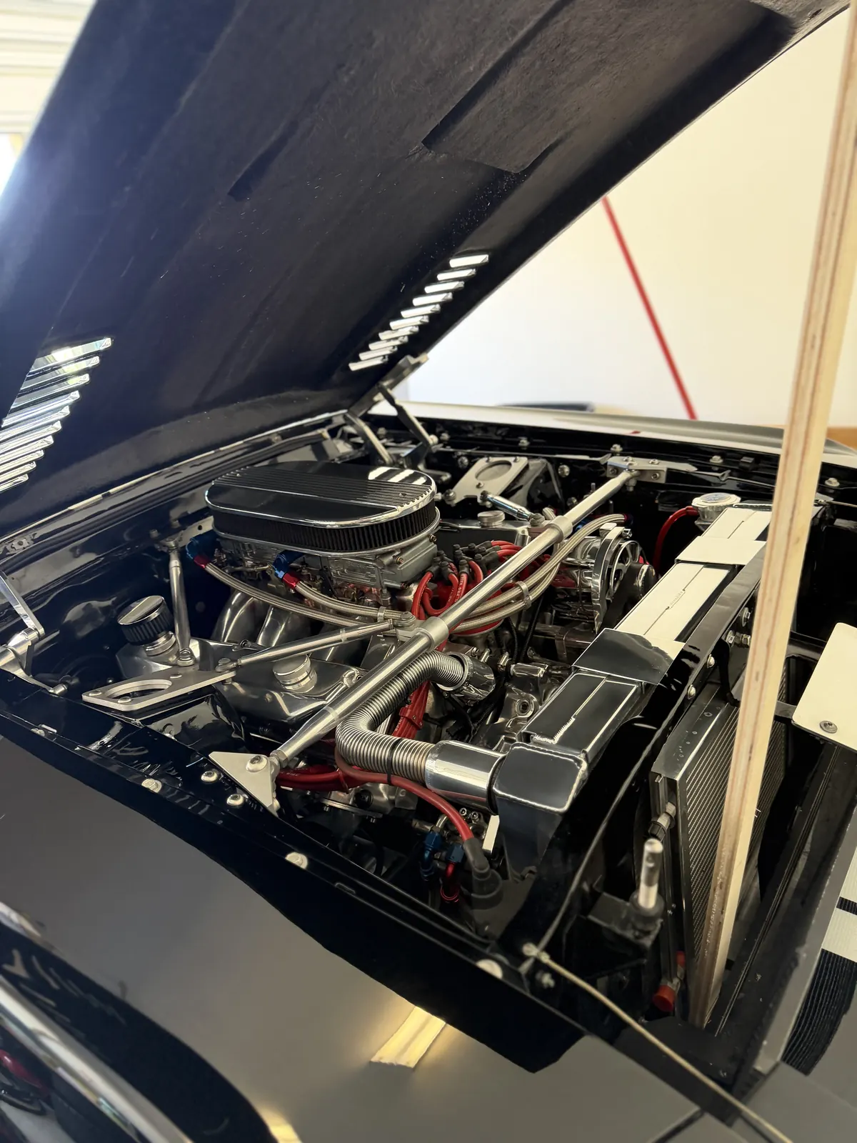 Detailed classic muscle car engine bay