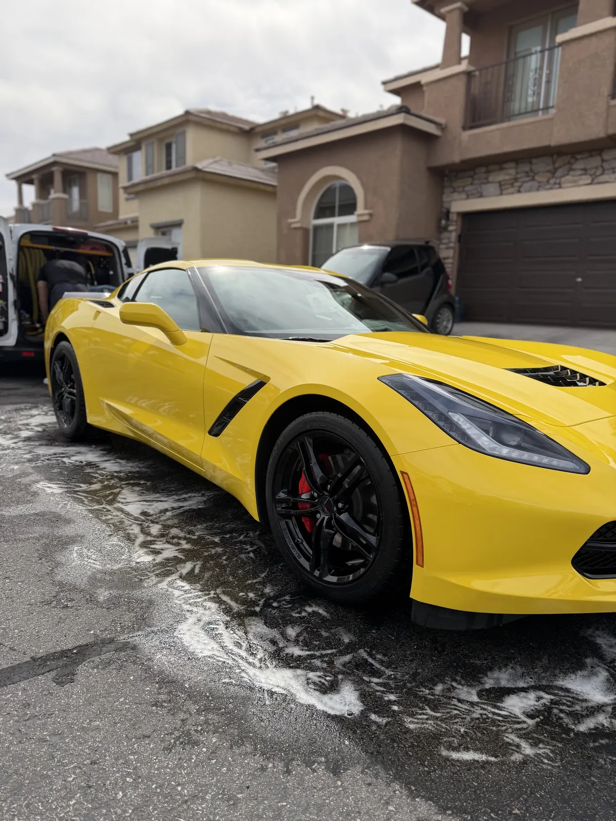 Yellow Corvette after an exterior wash
